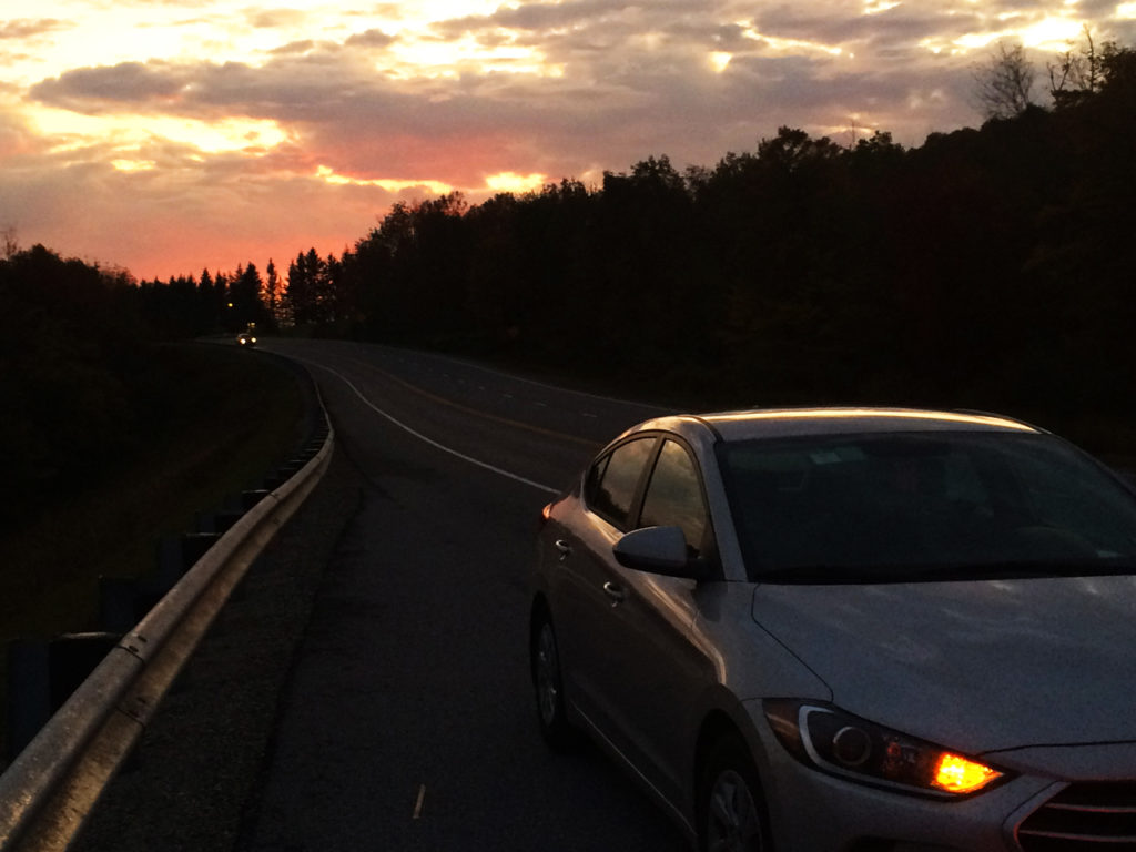 Usa-Road-trip-Car-sunset